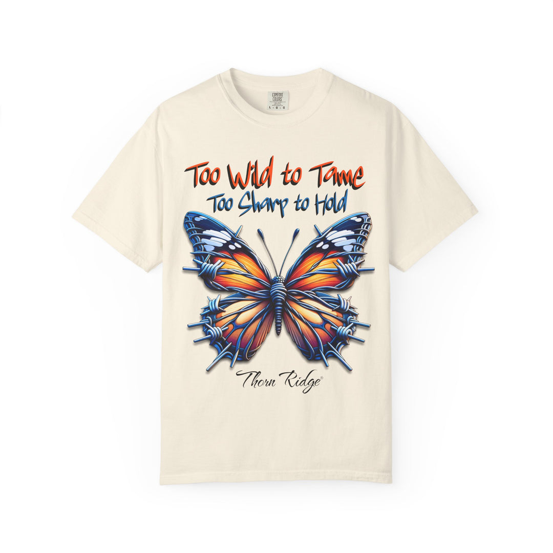 Too Wild To Tame Too Sharp To Hold Graphic Tee with a butterfly with barbed wire wings labeled Thorn Ridge. 