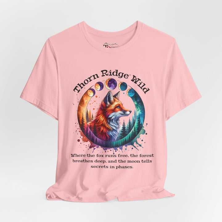 Thorn Ridge Wild Graphic Tee featuring a fox, forest, and moon phases. 