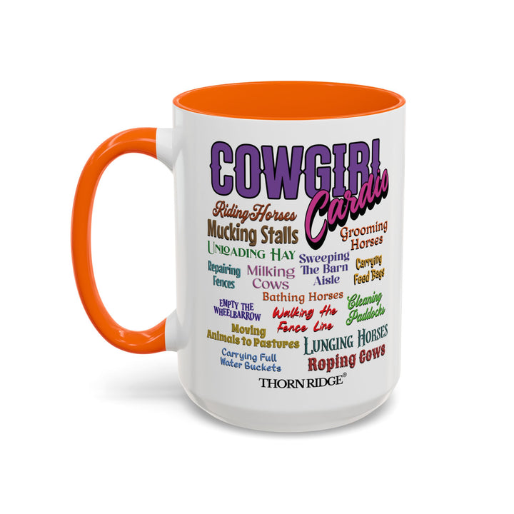 Mug with 'Cowgirl Cardio' text and orange handle on a white background