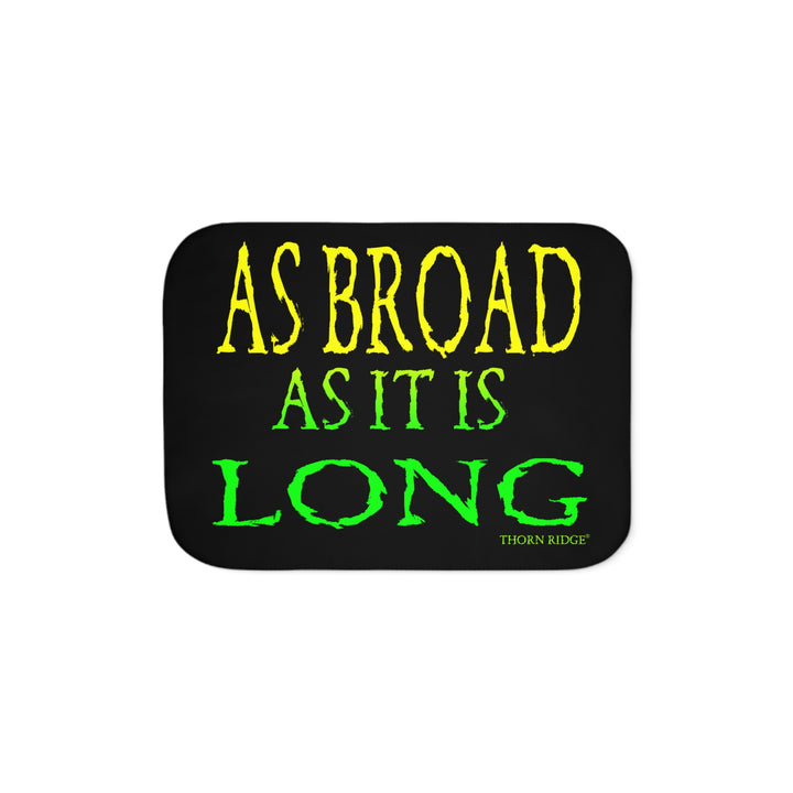 Black sherpa blanket with yellow and green text 'AS BROAD AS IT IS LONG' and 'THORN RIDGE' branding.