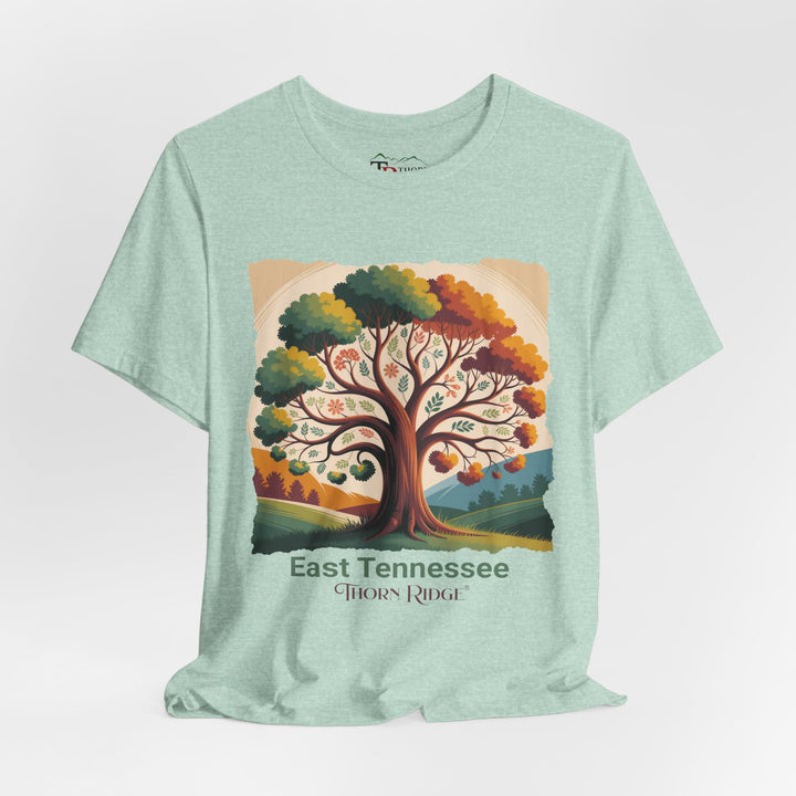t-shirt with a colorful tree design and 'East Tennessee Thorn Ridge' text showing leaves changing during the fall of the year. 