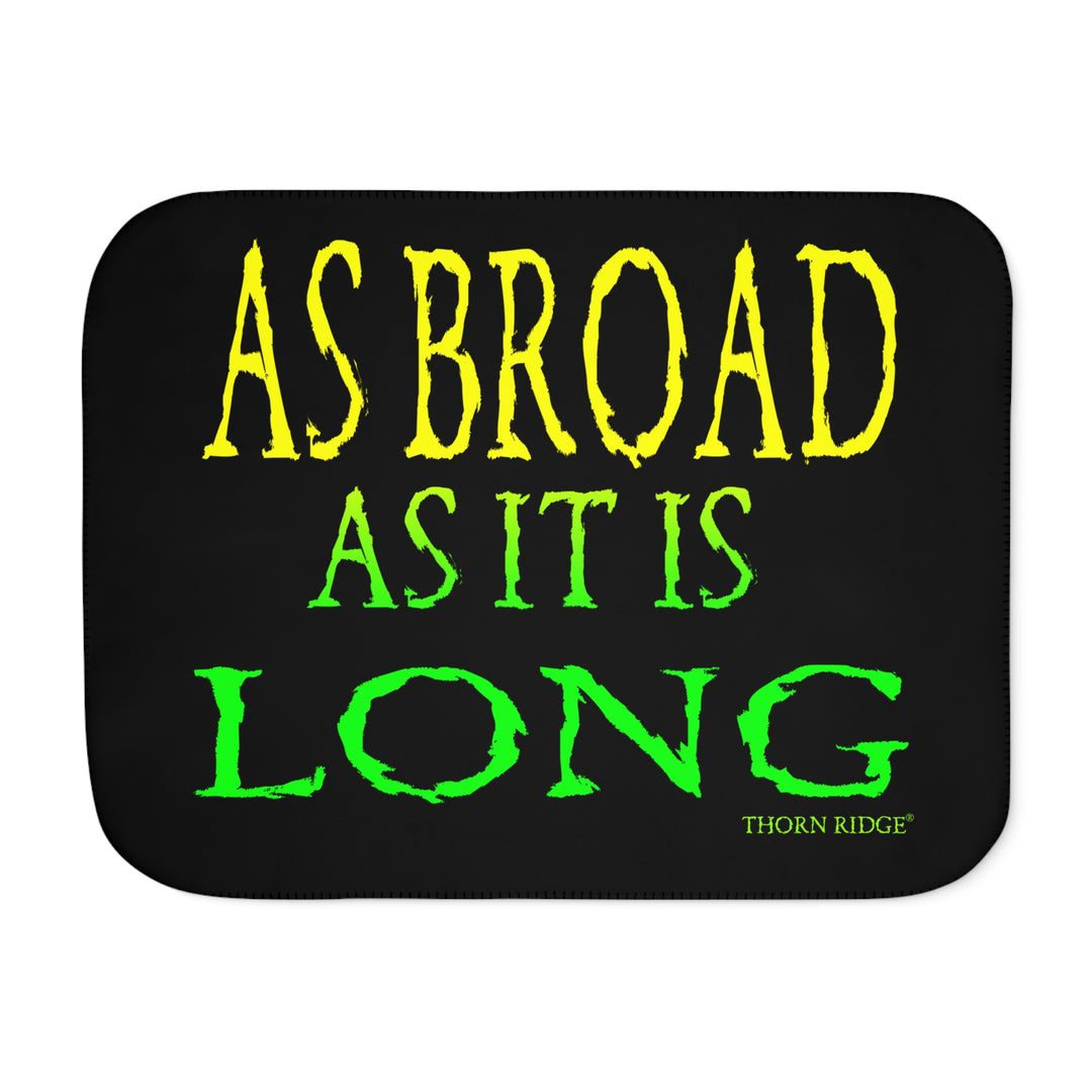 Black sherpa blanket with yellow and green text 'AS BROAD AS IT IS LONG' and 'THORN RIDGE' branding.