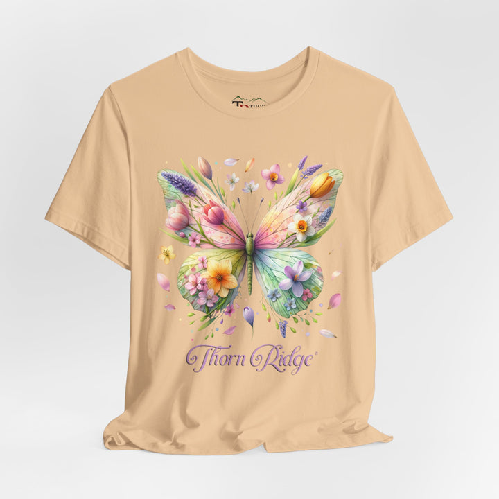 Floral butterfly tee in pastel colors labeled Thorn Ridge®