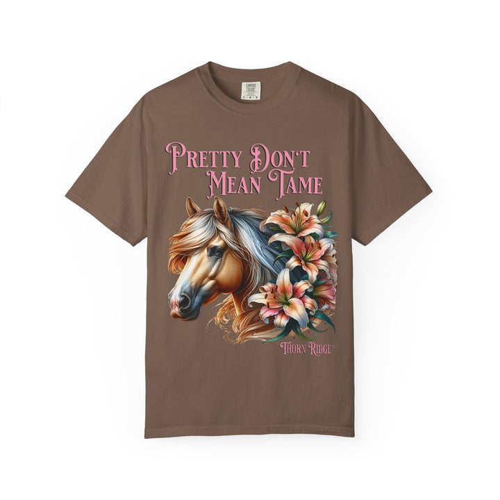 Pretty Don't Mean Tame graphic tee with a horse head and flowers branded to Thorn Ridge®