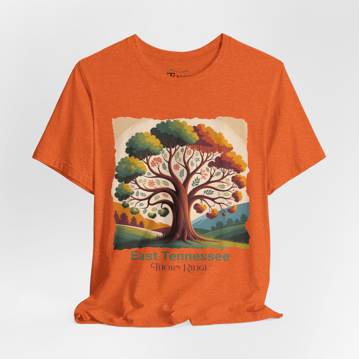 t-shirt with a colorful tree design and 'East Tennessee Thorn Ridge' text showing leaves changing during the fall of the year. 