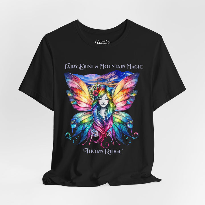 Fairy Dust and Mountain Magic graphic tee with a winged fairy in the front and mountains in the background labeled Thorn Ridge®