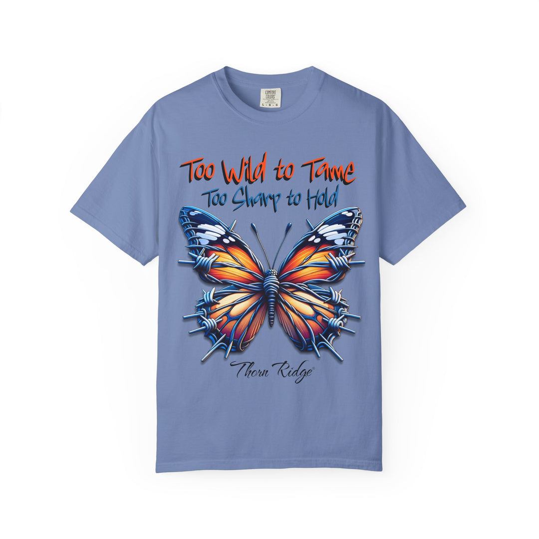 Too Wild To Tame Too Sharp To Hold Graphic Tee with a butterfly with barbed wire wings labeled Thorn Ridge. 