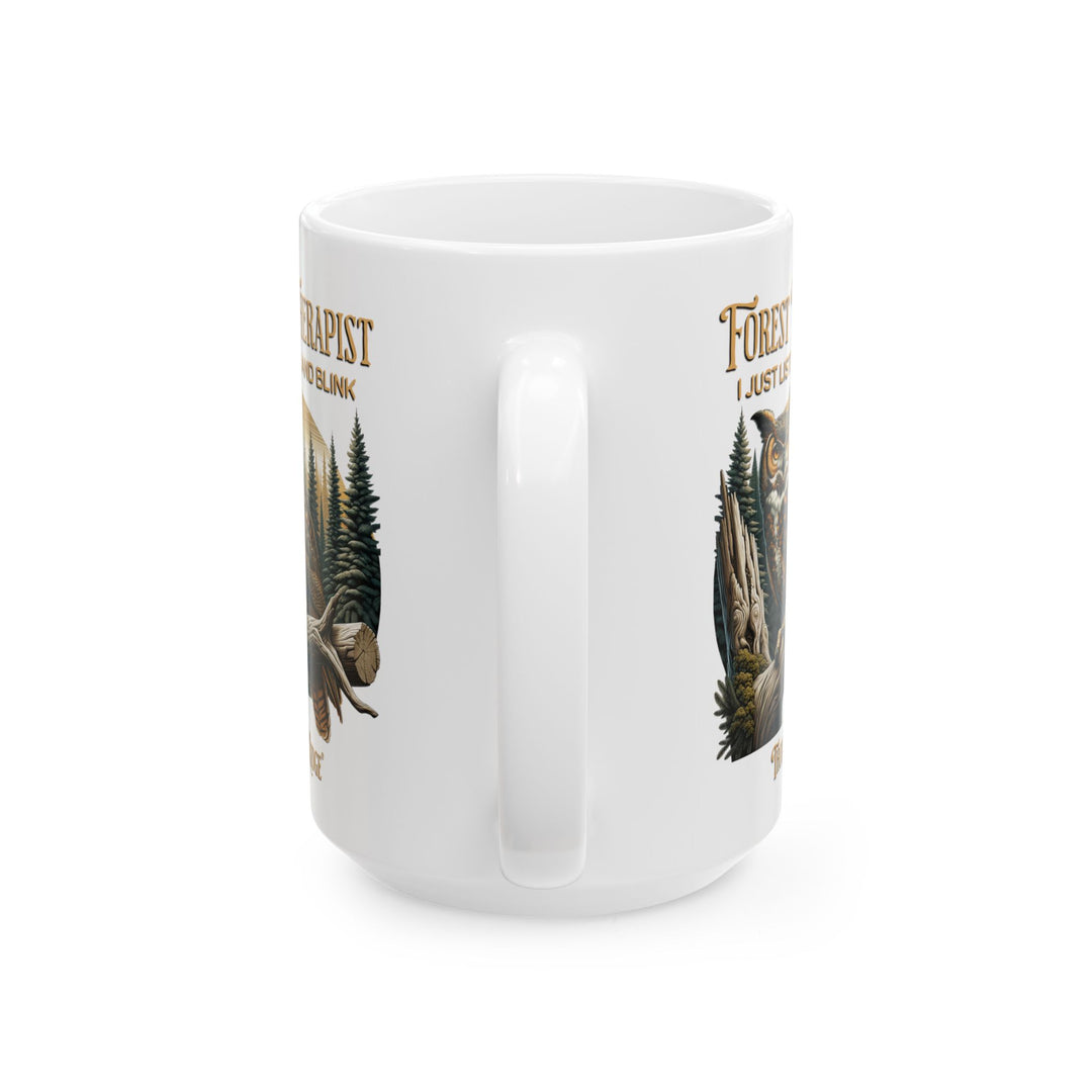 White mug with an owl design and text Forest Therapist by Thorn Ridge®