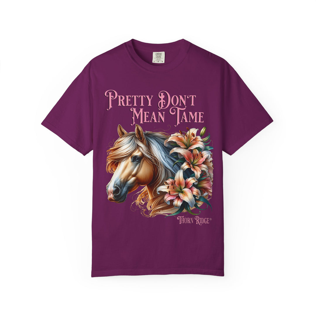 Pretty Don't Mean Tame graphic tee with a horse head and flowers branded to Thorn Ridge®