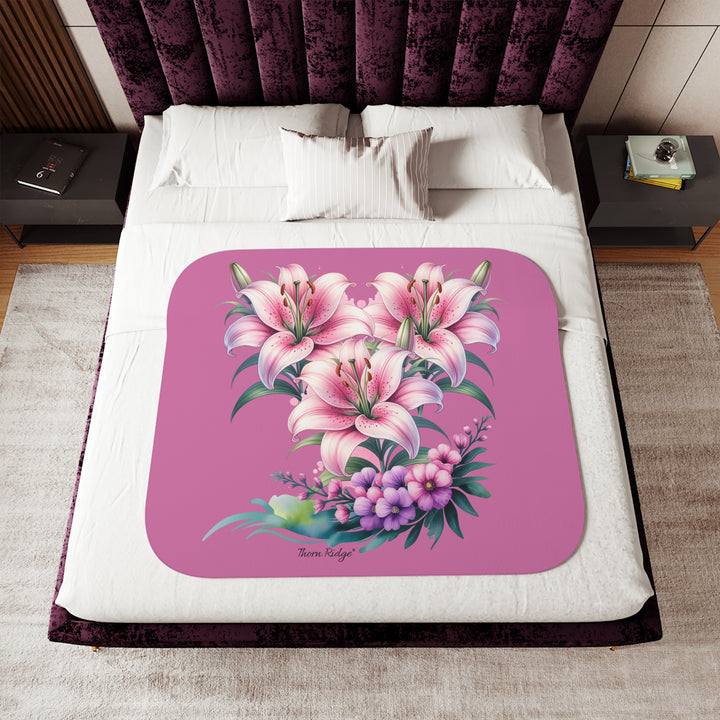 Three Lillies illustraton in pink on a pink sherpa blanket by Thorn Ridge®