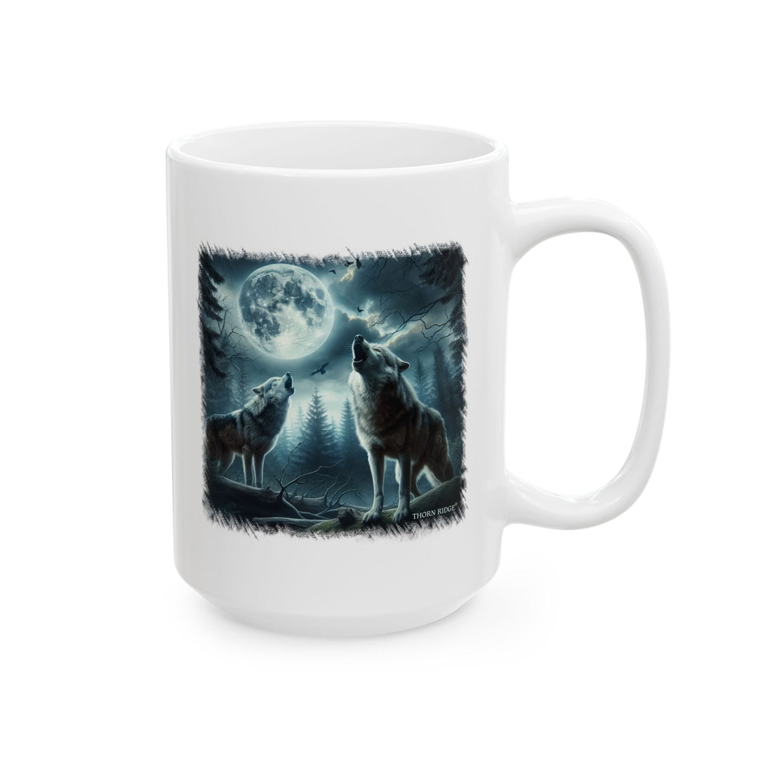 moonlit wolves mug by Thorn Ridge® of two wolves howling at the moon and a cloudy sky.