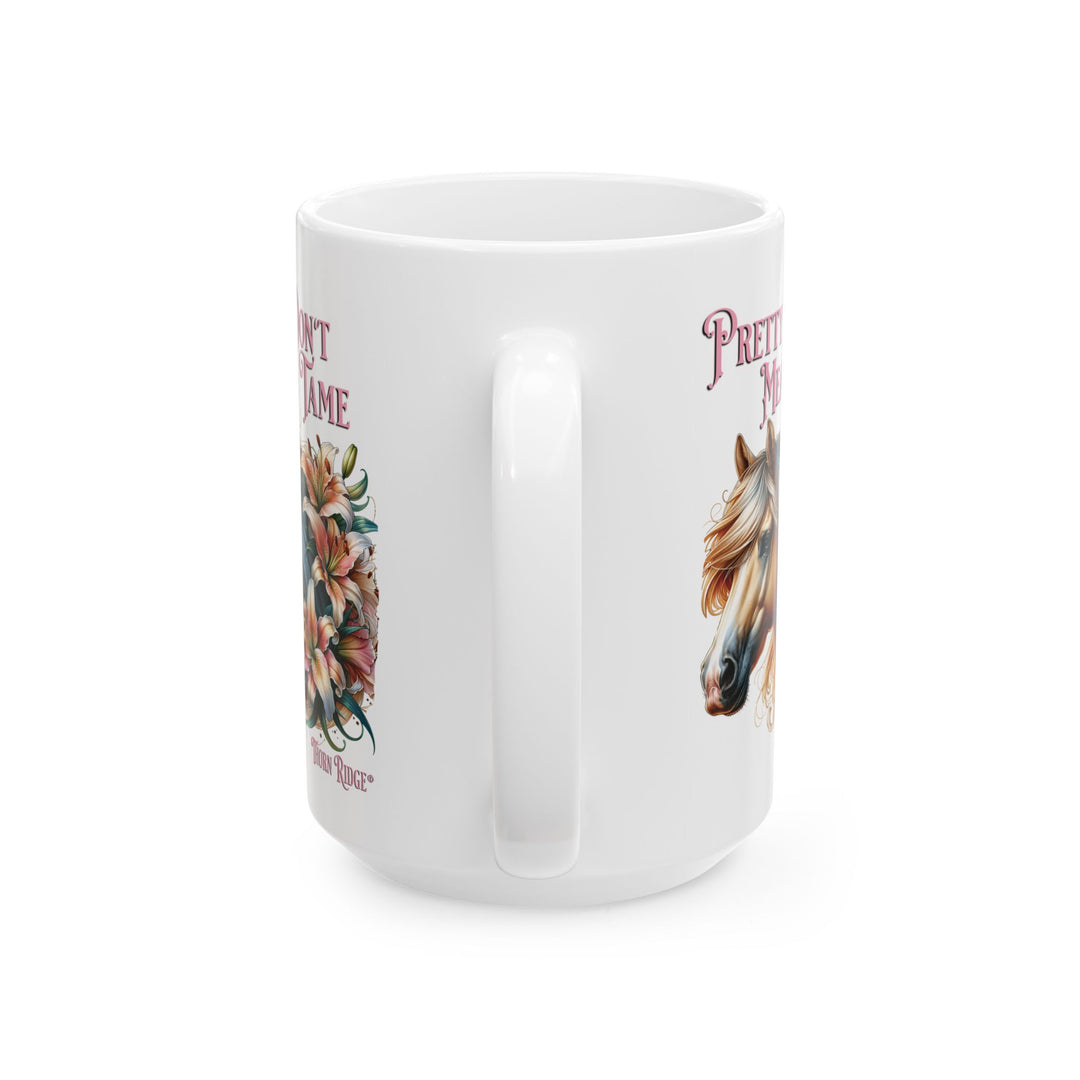 White mug with a horse and floral design, featuring the text 'Pretty Don't Mean Tame' by Thorn Ridge®