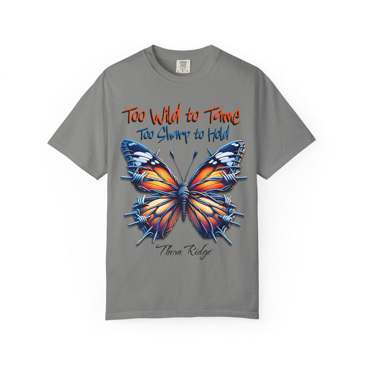 Too Wild To Tame Too Sharp To Hold Graphic Tee with a butterfly with barbed wire wings labeled Thorn Ridge. 