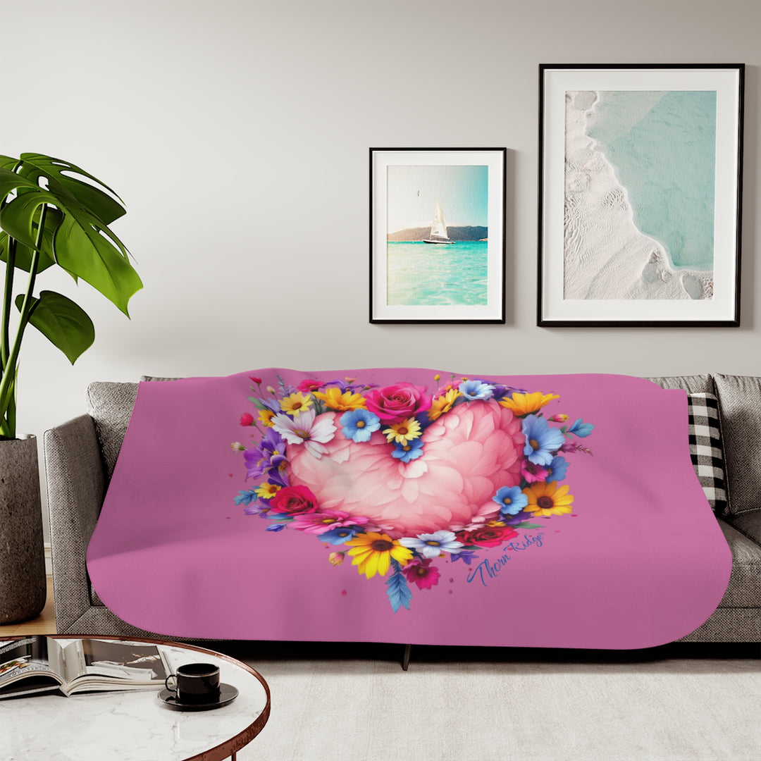 Feathers & Flowers Heart Sherpa Blanket in pinks with a feather heart surrounded by flowers by Thorn Ridge®