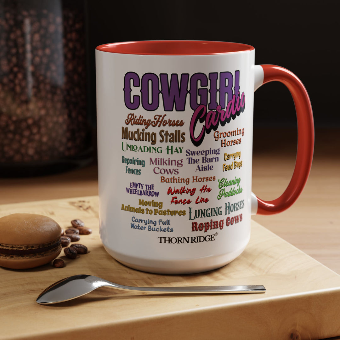 Mug with 'Cowgirl Cardio' text and red handle on a white background