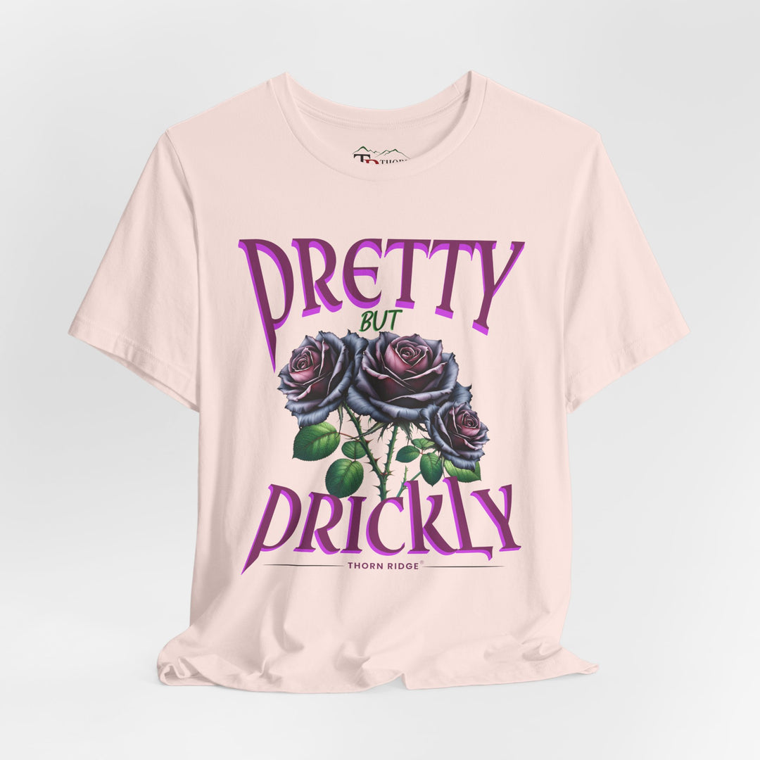 Pretty But Prickly Thorn Ridge Roses Branded t-shirt in purple with black and purple roses. 