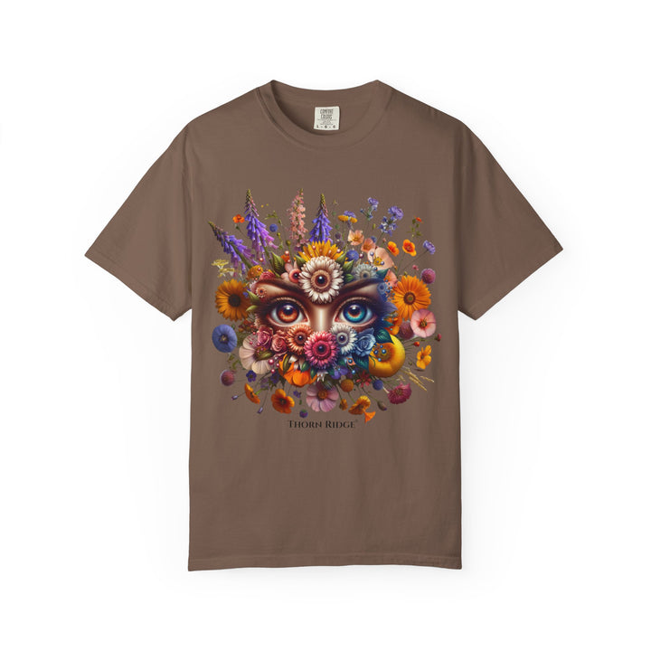 t-shirt with a colorful floral design and eyes in the center that seem like they're watching you. Branded Thorn Ridge®.
