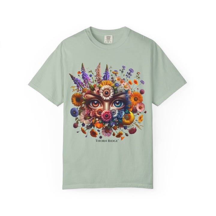 t-shirt with a colorful floral design and eyes in the center that seem like they're watching you. Branded Thorn Ridge®.