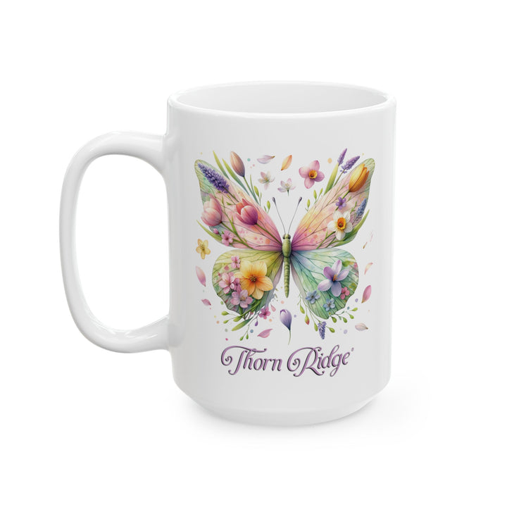 White mug with a colorful butterfly and floral design by Thorn Ridge®