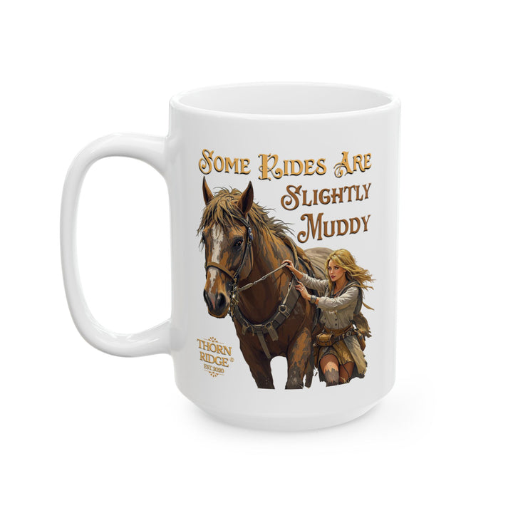 White mug with a horse and rider illustration and text 'Some Rides Are Slightly Muddy' by Thorn Ridge®