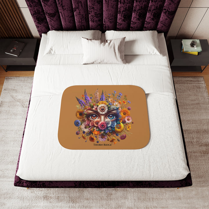 Colorful floral design with eyes on a brown background, featuring the brand 'Thorn Ridge'.