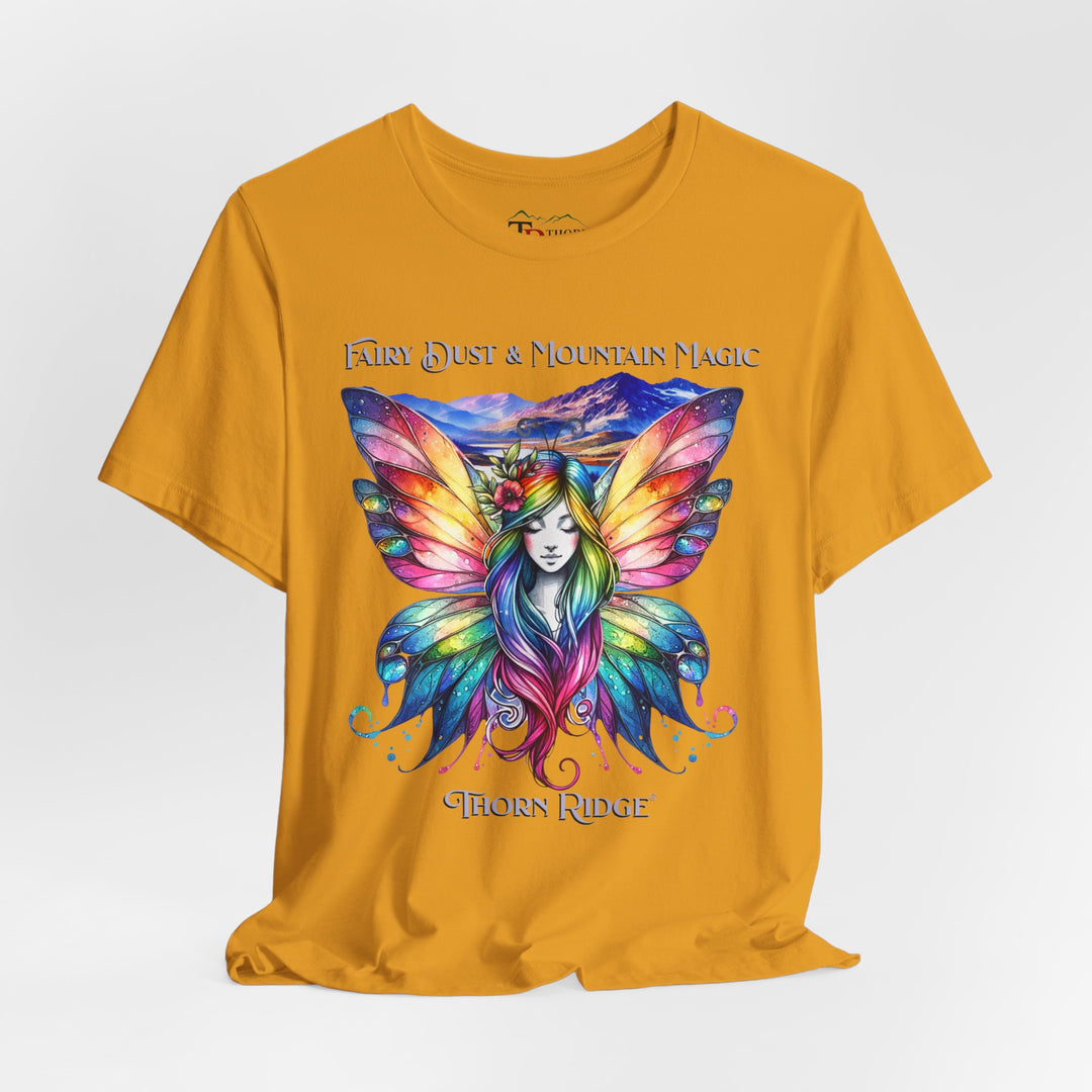 Fairy Dust and Mountain Magic graphic tee with a winged fairy in the front and mountains in the background labeled Thorn Ridge®