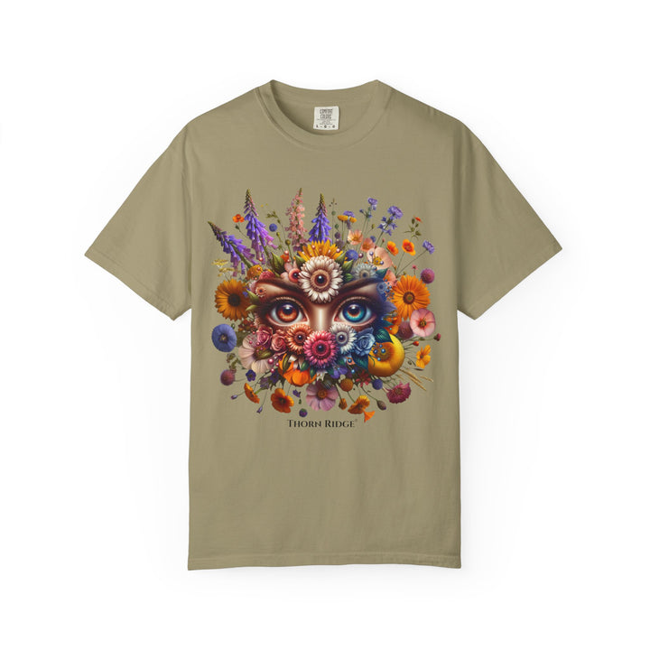 t-shirt with a colorful floral design and eyes in the center that seem like they're watching you. Branded Thorn Ridge®.