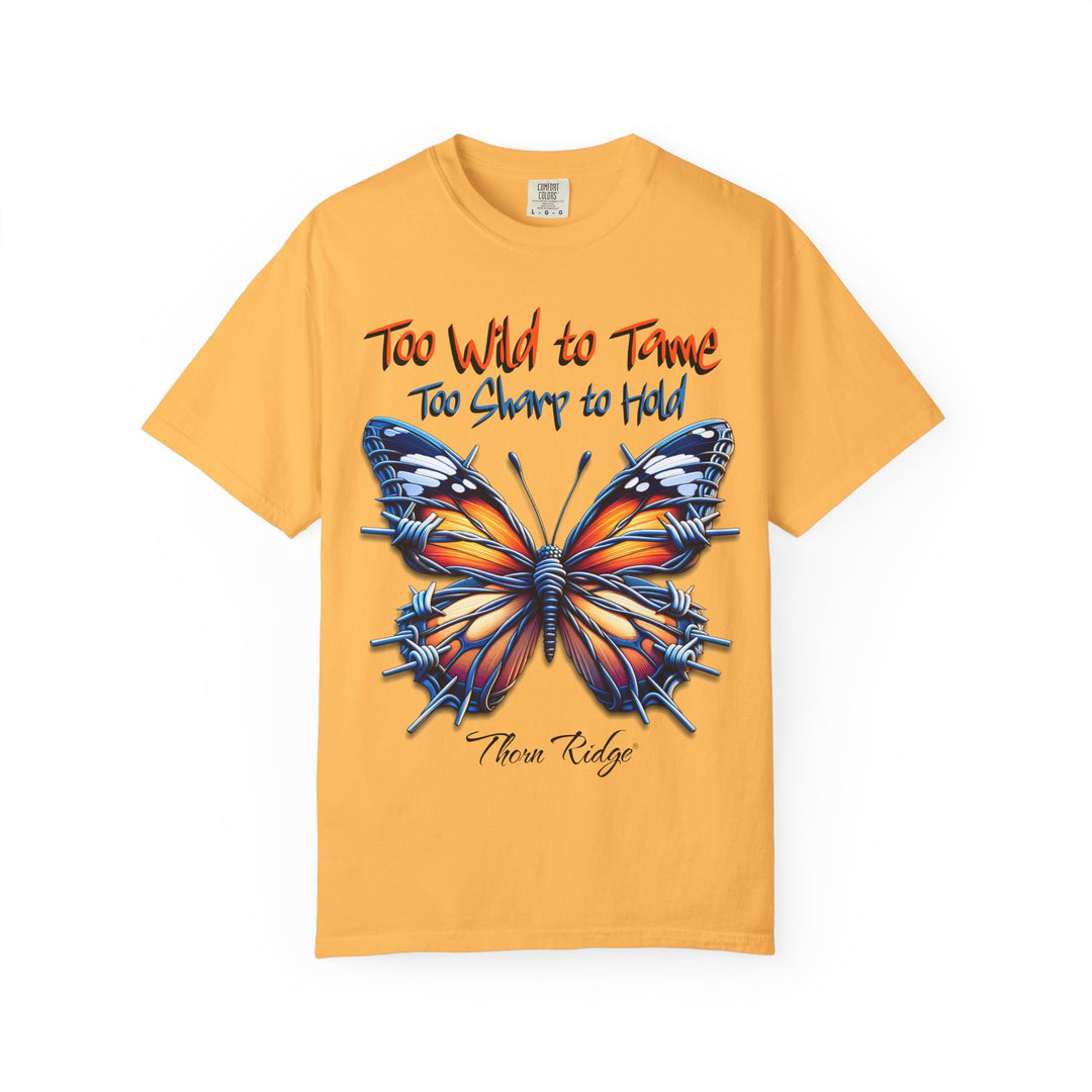 Too Wild To Tame Too Sharp To Hold Graphic Tee with a butterfly with barbed wire wings labeled Thorn Ridge. 