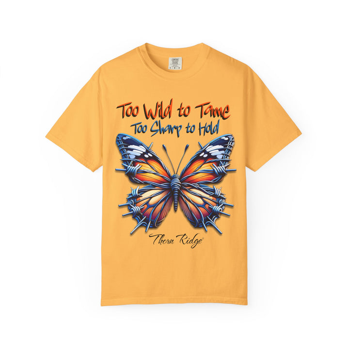 Too Wild To Tame Too Sharp To Hold Graphic Tee with a butterfly with barbed wire wings labeled Thorn Ridge. 