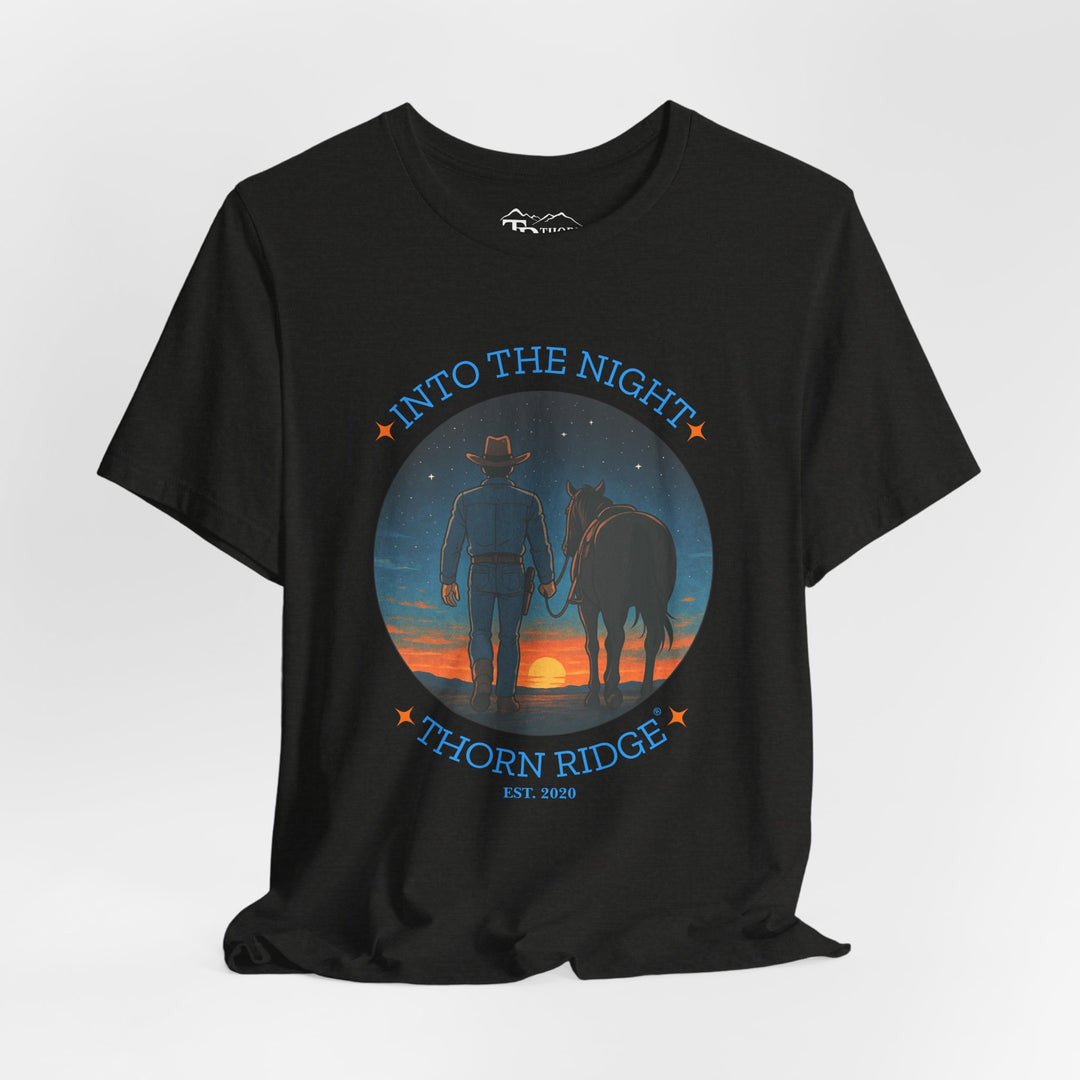 t-shirt with 'Into the Night' and 'Thorn Ridge' graphic design of a cowboy leading his horse into the setting sun as night is falling.