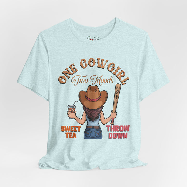 t-shirt with a graphic of a cowgirl holding a drink and a bat, with text 'One Cowgirl Two Moods Sweet Tea Throw Down' labeled Thorn Ridge®