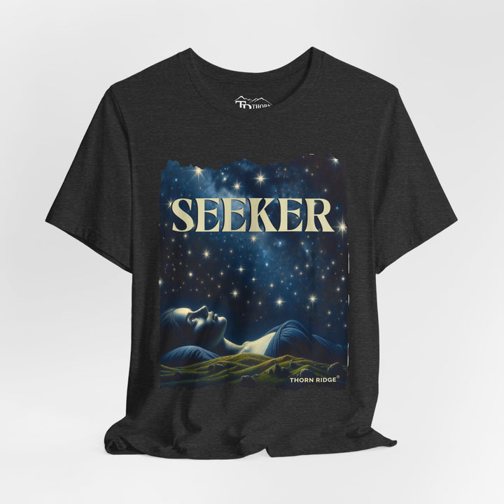 t-shirt labeled Seeker with the graphic of a woman laying on her back looking at the stars labeled Thorn Ridge®