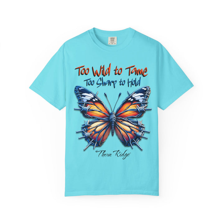 Too Wild To Tame Too Sharp To Hold Graphic Tee with a butterfly with barbed wire wings labeled Thorn Ridge. 