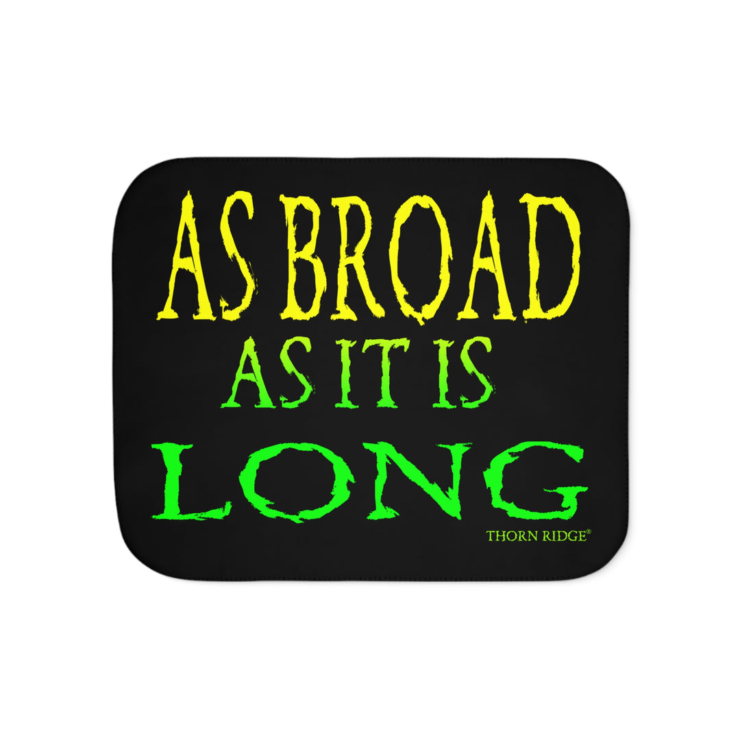 Black sherpa blanket with yellow and green text 'AS BROAD AS IT IS LONG' and 'THORN RIDGE' branding.