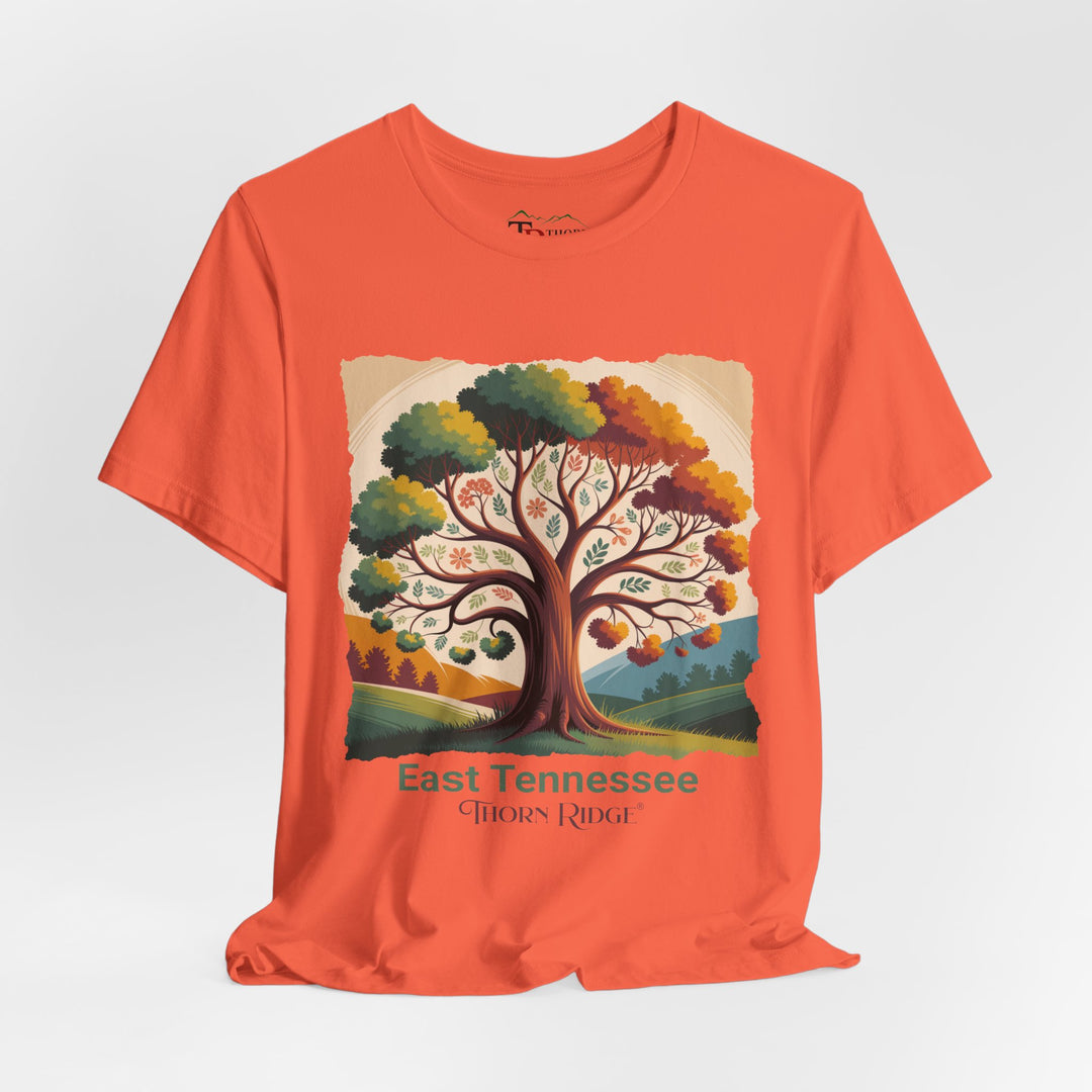 t-shirt with a colorful tree design and 'East Tennessee Thorn Ridge' text showing leaves changing during the fall of the year. 