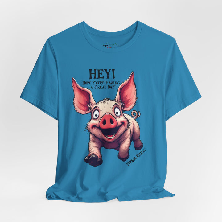 pig running toward you with ears flapping in the wind and the text Hey! Hope you're having a great day and labeled Thorn Ridge®
