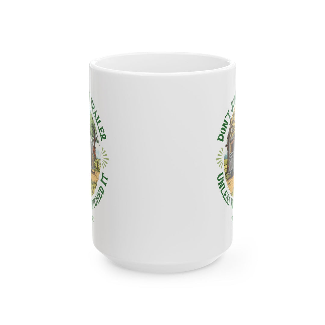 White mug with a graphic of a horse and horse trailer and text 'Don't Judge My Trailer Unless You've Hitched It' by Thorn Ridge®
