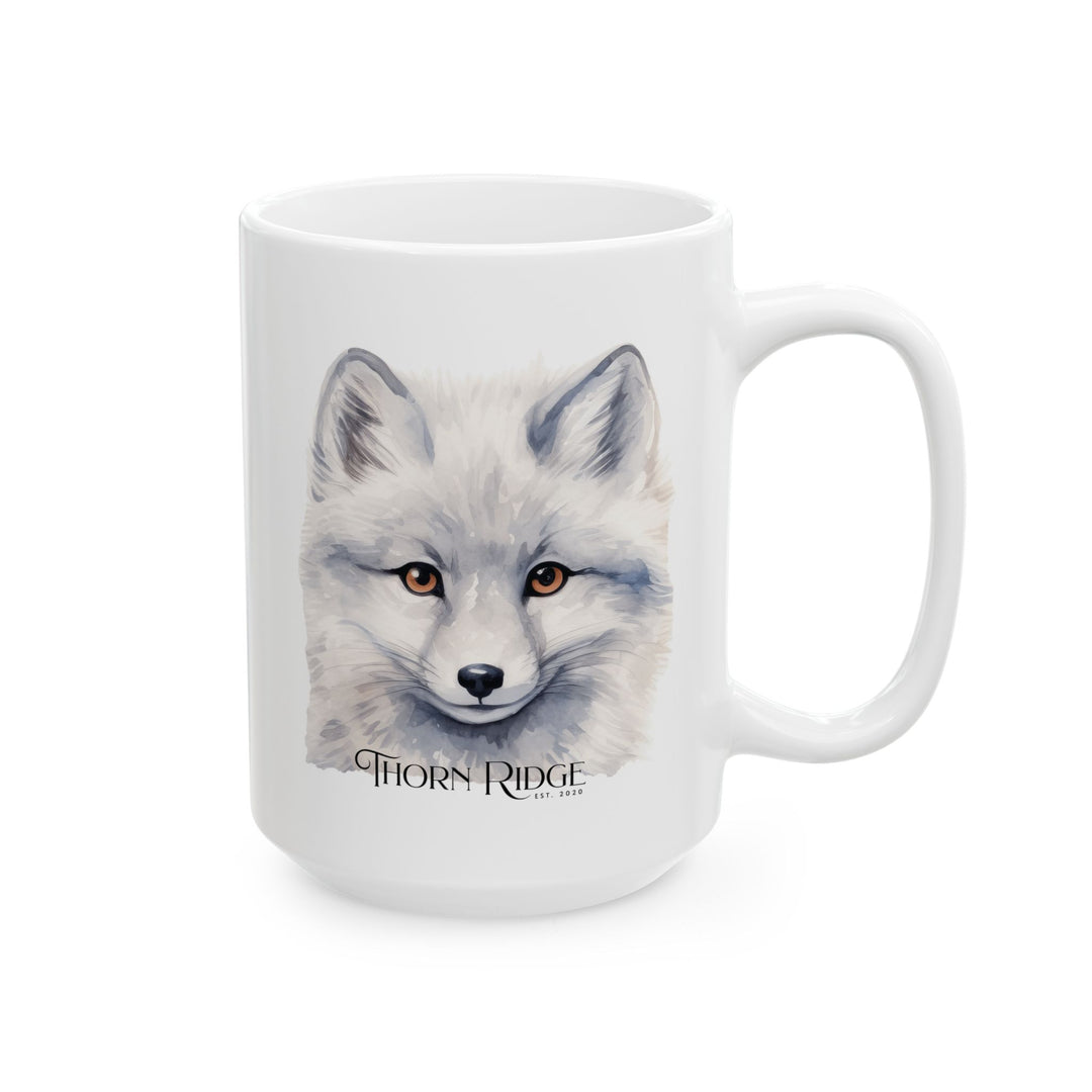 White mug with a graphic of a artic fox head and 'Thorn Ridge' text on a white background