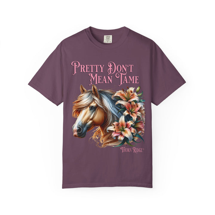 Pretty Don't Mean Tame graphic tee with a horse head and flowers branded to Thorn Ridge®