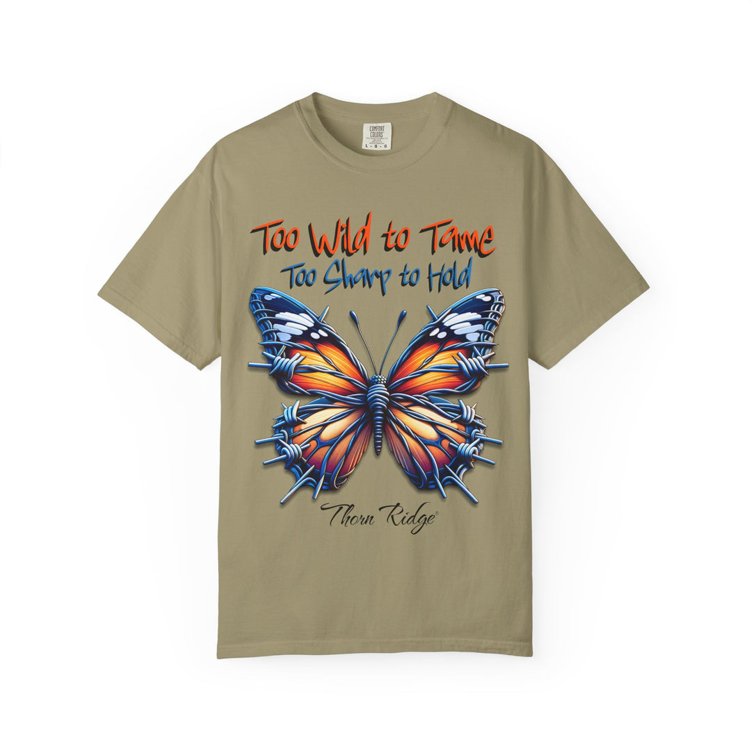 Too Wild To Tame Too Sharp To Hold Graphic Tee with a butterfly with barbed wire wings labeled Thorn Ridge. 