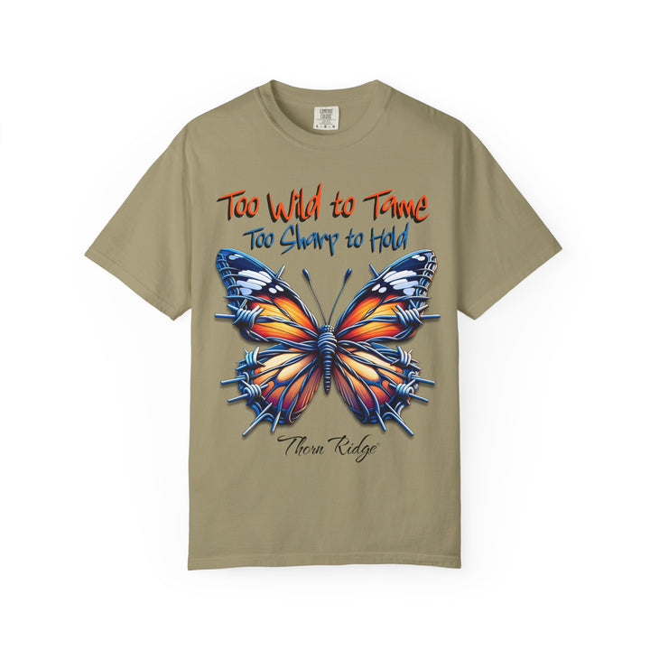 Too Wild To Tame Too Sharp To Hold Graphic Tee with a butterfly with barbed wire wings labeled Thorn Ridge. 