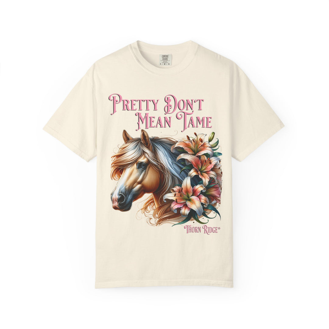 Pretty Don't Mean Tame graphic tee with a horse head and flowers branded to Thorn Ridge®