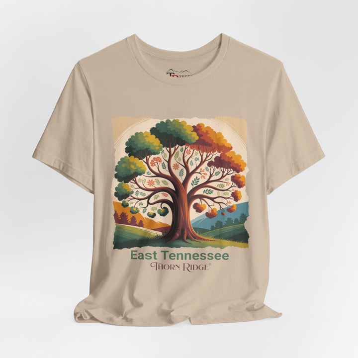 t-shirt with a colorful tree design and 'East Tennessee Thorn Ridge' text showing leaves changing during the fall of the year. 