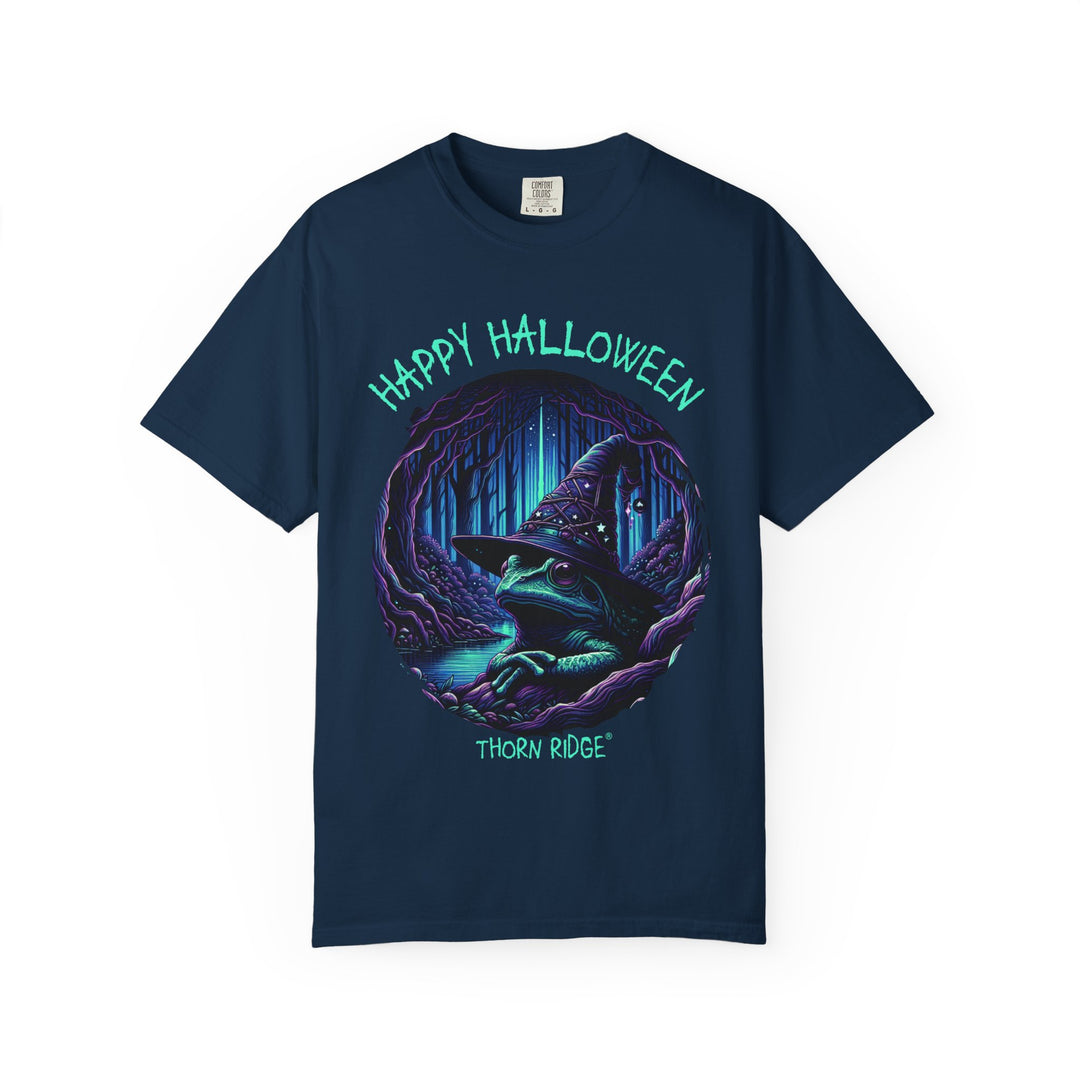 Happy Halloween from The Frog Witch labeled Thorn Ridge. Frog with a witches hat sitting by a dark stream in a wicked forest. 