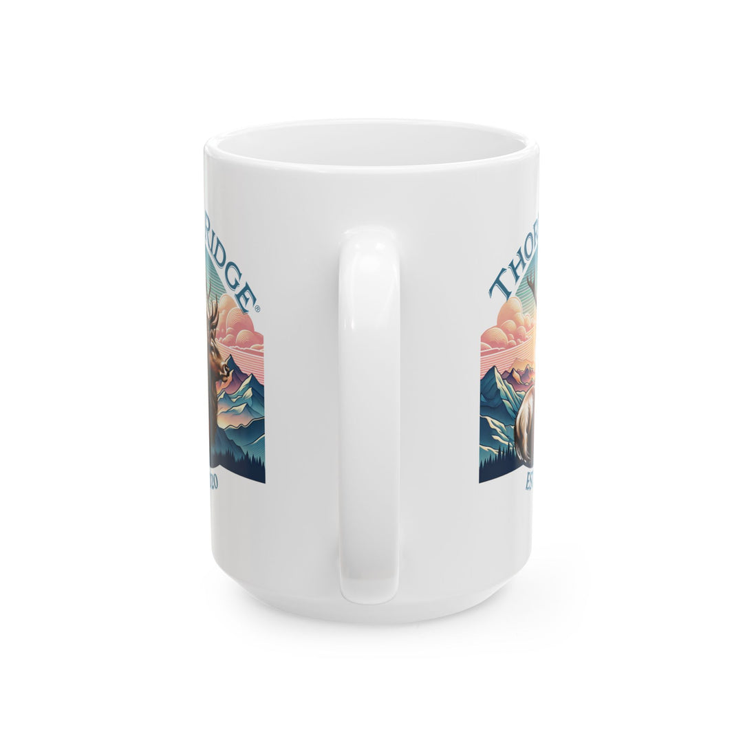 Guardian Buck mug by Thorn Ridge®. White mug with a deer and mountain design and 'Thorn Ridge' text on a white background