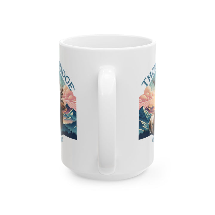 Guardian Buck mug by Thorn Ridge®. White mug with a deer and mountain design and 'Thorn Ridge' text on a white background