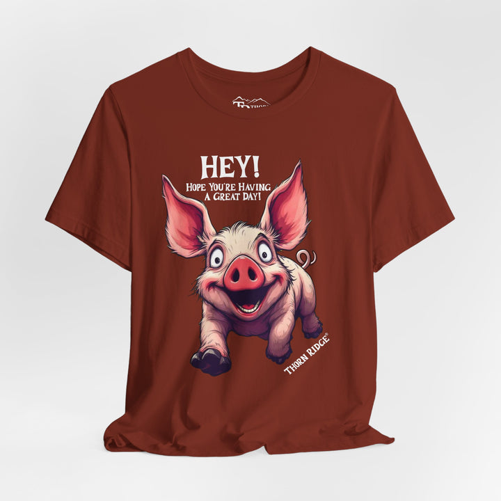 pig running toward you with ears flapping in the wind and the text Hey! Hope you're having a great day and labeled Thorn Ridge®