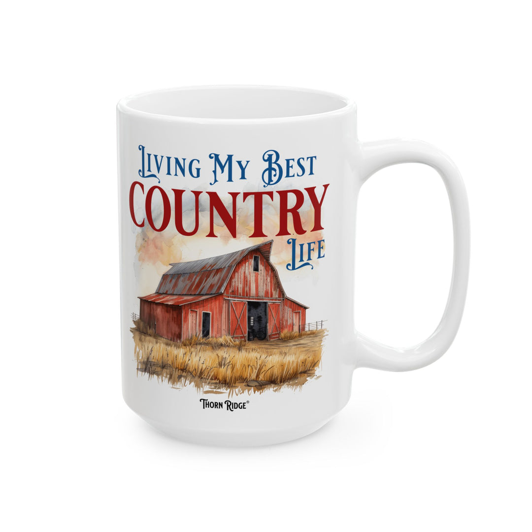 Mug with a red barn illustration and 'Living My Best Country Life' text on a white background with Thorn Ridge branding.