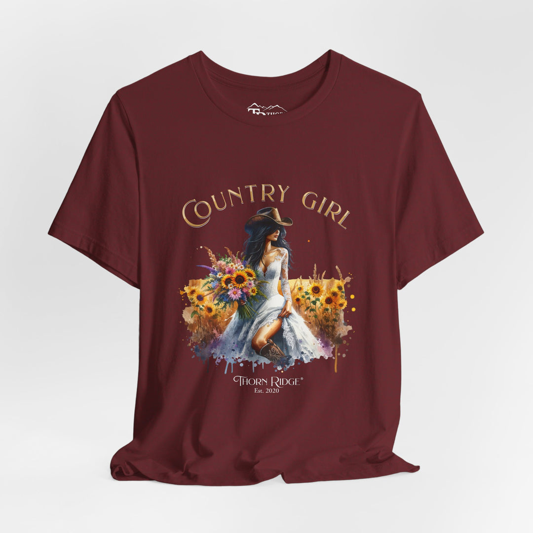 t-shirt with 'Country Girl' graphic design featuring a woman in a white dress and sunflowers and labeled Thorn Ridge®