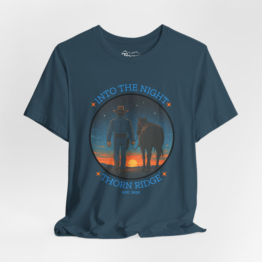 t-shirt with 'Into the Night' and 'Thorn Ridge' graphic design of a cowboy leading his horse into the setting sun as night is falling.